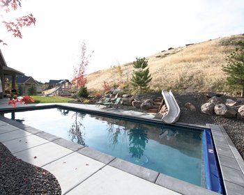<div class='closebutton' onclick='return hs.close(this)' title='Close'></div><div class='firstH'><img src='/images/logo-white-small.png'></div><h1>Gunite Pool</h1><p>Gunite Pool #039 by Aquatech Pools by CHI</p><div class='getSocial'><h1>Share</h1><p class='photoBy'>Photo by Aquatech Pools by CHI</p><iframe src='http://www.facebook.com/plugins/like.php?href=http%3A%2F%2Fchipool.com%2Fimages%2Fgalleries%2Fgunite-pools%2Fwm%2Fgunite-pool-by-aquatech-pools-by-chi-039.jpg&send=false&layout=button_count&width=100&show_faces=false&action=like&colorscheme=light&font&height=21' scrolling='no' frameborder='0' style='border:none; overflow:hidden; width:100px; height:21px;' allowTransparency='true'></iframe><br><a href='http://pinterest.com/pin/create/button/?url=http%3A%2F%2Fwww.chipool.com&media=http%3A%2F%2Fwww.chipool.com%2Fimages%2Fgalleries%2Fgunite-pools%2Fwm%2Fgunite-pool-by-aquatech-pools-by-chi-039.jpg&description=Pools' data-pin-do='buttonPin' data-pin-config='above'><img src='http://assets.pinterest.com/images/pidgets/pin_it_button.png' /></a></div>