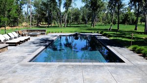 <div class='closebutton' onclick='return hs.close(this)' title='Close'></div><div class='firstH'><img src='/images/logo-white-small.png'></div><h1>Gunite Pool</h1><p>Gunite Pool #045 by Aquatech Pools by CHI</p><div class='getSocial'><h1>Share</h1><p class='photoBy'>Photo by Aquatech Pools by CHI</p><iframe src='http://www.facebook.com/plugins/like.php?href=http%3A%2F%2Fchipool.com%2Fimages%2Fgalleries%2Fgunite-pools%2Fwm%2Fgunite-pool-by-aquatech-pools-by-chi-045.jpg&send=false&layout=button_count&width=100&show_faces=false&action=like&colorscheme=light&font&height=21' scrolling='no' frameborder='0' style='border:none; overflow:hidden; width:100px; height:21px;' allowTransparency='true'></iframe><br><a href='http://pinterest.com/pin/create/button/?url=http%3A%2F%2Fwww.chipool.com&media=http%3A%2F%2Fwww.chipool.com%2Fimages%2Fgalleries%2Fgunite-pools%2Fwm%2Fgunite-pool-by-aquatech-pools-by-chi-045.jpg&description=Pools' data-pin-do='buttonPin' data-pin-config='above'><img src='http://assets.pinterest.com/images/pidgets/pin_it_button.png' /></a></div>