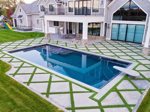 <div class='closebutton' onclick='return hs.close(this)' title='Close'></div><div class='firstH'><img src='/images/logo-white-small.png'></div><h1>Gunite Pool</h1><p>Gunite Pool #046 by Aquatech Pools by CHI</p><div class='getSocial'><h1>Share</h1><p class='photoBy'>Photo by Aquatech Pools by CHI</p><iframe src='http://www.facebook.com/plugins/like.php?href=http%3A%2F%2Fchipool.com%2Fimages%2Fgalleries%2Fgunite-pools%2Fwm%2Fgunite-pool-by-aquatech-pools-by-chi-046.jpg&send=false&layout=button_count&width=100&show_faces=false&action=like&colorscheme=light&font&height=21' scrolling='no' frameborder='0' style='border:none; overflow:hidden; width:100px; height:21px;' allowTransparency='true'></iframe><br><a href='http://pinterest.com/pin/create/button/?url=http%3A%2F%2Fwww.chipool.com&media=http%3A%2F%2Fwww.chipool.com%2Fimages%2Fgalleries%2Fgunite-pools%2Fwm%2Fgunite-pool-by-aquatech-pools-by-chi-046.jpg&description=Pools' data-pin-do='buttonPin' data-pin-config='above'><img src='http://assets.pinterest.com/images/pidgets/pin_it_button.png' /></a></div>