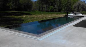 <div class='closebutton' onclick='return hs.close(this)' title='Close'></div><div class='firstH'><img src='/images/logo-white-small.png'></div><h1>Gunite Pool</h1><p>Gunite Pool #050 by Aquatech Pools by CHI</p><div class='getSocial'><h1>Share</h1><p class='photoBy'>Photo by Aquatech Pools by CHI</p><iframe src='http://www.facebook.com/plugins/like.php?href=http%3A%2F%2Fchipool.com%2Fimages%2Fgalleries%2Fgunite-pools%2Fwm%2Fgunite-pool-by-aquatech-pools-by-chi-050.jpg&send=false&layout=button_count&width=100&show_faces=false&action=like&colorscheme=light&font&height=21' scrolling='no' frameborder='0' style='border:none; overflow:hidden; width:100px; height:21px;' allowTransparency='true'></iframe><br><a href='http://pinterest.com/pin/create/button/?url=http%3A%2F%2Fwww.chipool.com&media=http%3A%2F%2Fwww.chipool.com%2Fimages%2Fgalleries%2Fgunite-pools%2Fwm%2Fgunite-pool-by-aquatech-pools-by-chi-050.jpg&description=Pools' data-pin-do='buttonPin' data-pin-config='above'><img src='http://assets.pinterest.com/images/pidgets/pin_it_button.png' /></a></div>