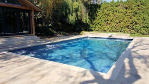 <div class='closebutton' onclick='return hs.close(this)' title='Close'></div><div class='firstH'><img src='/images/logo-white-small.png'></div><h1>Gunite Pool</h1><p>Gunite Pool #058 by Aquatech Pools by CHI</p><div class='getSocial'><h1>Share</h1><p class='photoBy'>Photo by Aquatech Pools by CHI</p><iframe src='http://www.facebook.com/plugins/like.php?href=http%3A%2F%2Fchipool.com%2Fimages%2Fgalleries%2Fgunite-pools%2Fwm%2Fgunite-pool-by-aquatech-pools-by-chi-058.jpg&send=false&layout=button_count&width=100&show_faces=false&action=like&colorscheme=light&font&height=21' scrolling='no' frameborder='0' style='border:none; overflow:hidden; width:100px; height:21px;' allowTransparency='true'></iframe><br><a href='http://pinterest.com/pin/create/button/?url=http%3A%2F%2Fwww.chipool.com&media=http%3A%2F%2Fwww.chipool.com%2Fimages%2Fgalleries%2Fgunite-pools%2Fwm%2Fgunite-pool-by-aquatech-pools-by-chi-058.jpg&description=Pools' data-pin-do='buttonPin' data-pin-config='above'><img src='http://assets.pinterest.com/images/pidgets/pin_it_button.png' /></a></div>